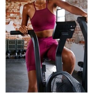 NWT FP Movement In the Saddle Bike Shorts pockets Aubergine Eggplant Pink Purple